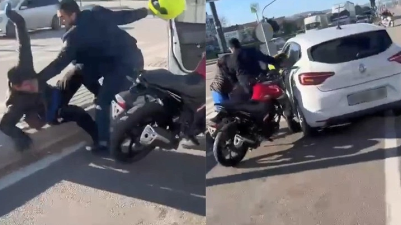 Motosiklet sürücüsünü kaskıyla dövdü